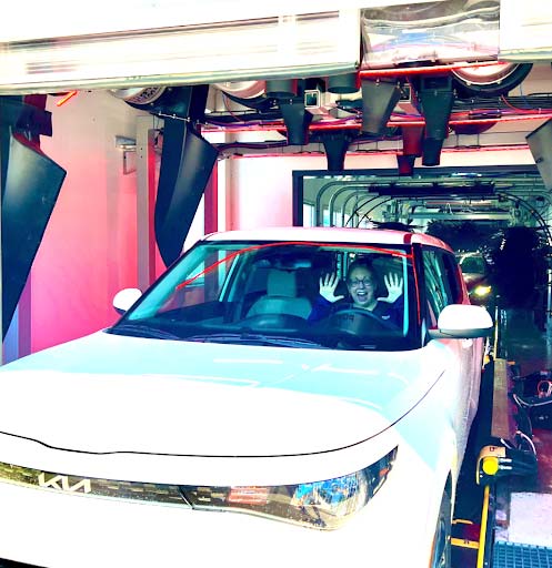 lady-in-white-kia-getting-a-car-wash---Spark-Car-Wash